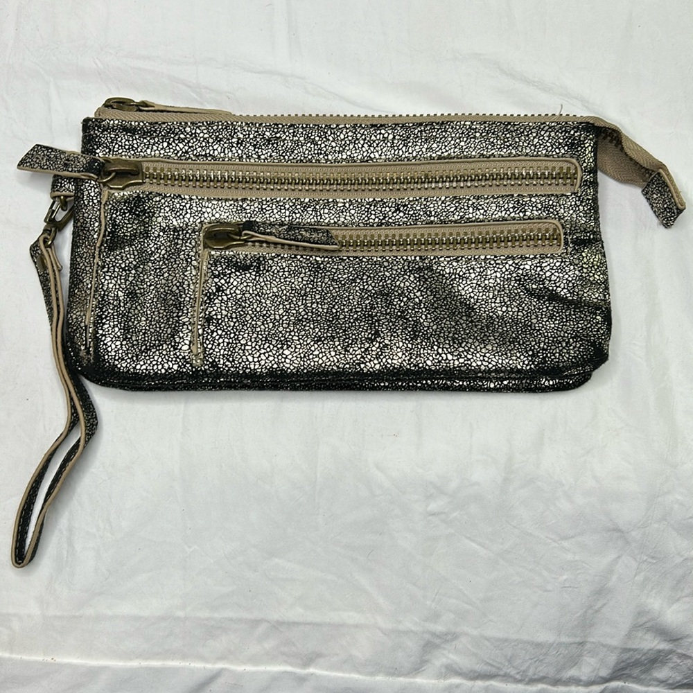 ENVY metallic and black printed super soft clutch. Double zippers in front.